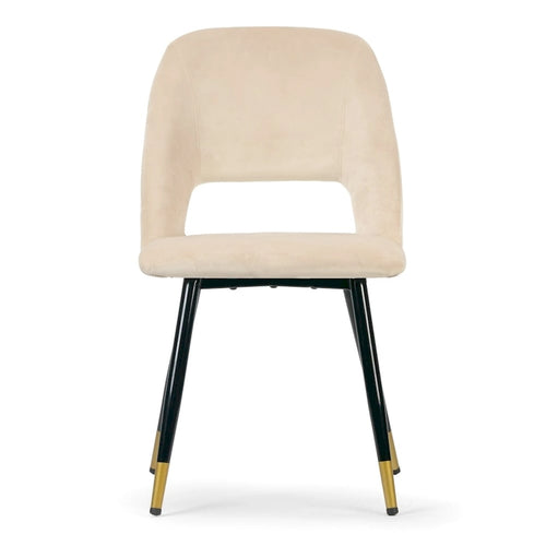 Chaise de salle à manger en velours beige avec dossier ouvert et pieds noirs accentués de doré