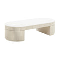 Table basse ovale crème en bois massif avec piétement sculptural nervuré