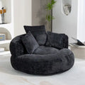 Fauteuil lounge rond pivotant en chenille avec coussins de dossier hauts