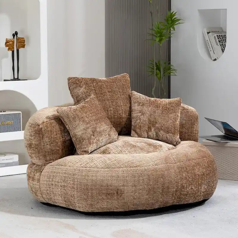 Fauteuil lounge rond pivotant en chenille avec coussins de dossier hauts
